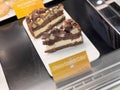 Close-up POV shot of delicious McDonalds Choco Crunch Cake with the high price