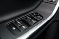 Close-up on power windows and mirrors control buttons Royalty Free Stock Photo