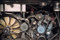 Close up powerful Diesel engine bus with Motor, pulleys, belt, gear and parts elements