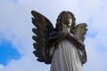 Close Up of Praying Angel Statue Royalty Free Stock Photo