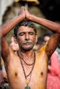 Close-up of praying men devotee in Thaipusam Festival.