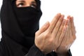 Close up of praying muslim woman in hijab
