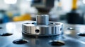 Close-Up of Precision Metal Component in Industrial Workshop Setting Royalty Free Stock Photo
