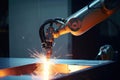 close-up of precision welding robot arm with welding torch in motion