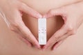 Close up pregnancy test with love women feeling happiness.