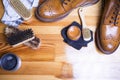 Close-up of Premium Tan Brogue Leather Boot with Set of Cleaning Tools