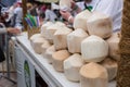 Close Up of Prepared Coconuts on Beverage Cart