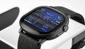 Modern black smartwatch displaying health data and metrics close up Royalty Free Stock Photo