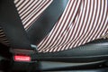 Close up press button of fasten safety seat belt in car. image for background Royalty Free Stock Photo