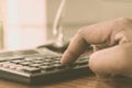 Close up of Press the right button. Calculator with finger. Fingers pressing the buttons of calculator. A businessman typing hand