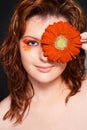 Close up pretty girl portrait with flower Royalty Free Stock Photo