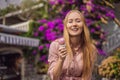 Close up of pretty tourist girl eating traditional gelato italian ice cream in a European town Royalty Free Stock Photo