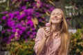 Close up of pretty tourist girl eating traditional gelato italian ice cream in a European town Royalty Free Stock Photo