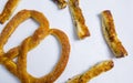 Close up of pretzel and chocolate stick bread on white background, cut out Royalty Free Stock Photo