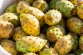 Close up of prickly pear cactus fruit on the plastic box. Ripe fruit.