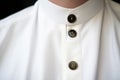 close-up of priest collar button detail Royalty Free Stock Photo