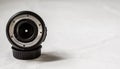 Close up of a prime camera lens against white background. Selective focus Royalty Free Stock Photo