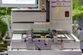 Close up print circuit board pcb on table jig of IC placer automatic pick and place machine for assembly electronic board Royalty Free Stock Photo