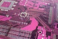 Close up of a printed purple computer circuit board Royalty Free Stock Photo
