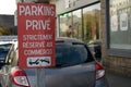 French road sign indicating private parking strictly reserved for shops