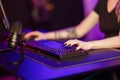 Close up of pro cyber sport gamer play game with keyboard and mouse Royalty Free Stock Photo