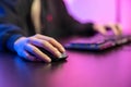 Close up of pro cyber sport gamer play game with keyboard and mouse Royalty Free Stock Photo