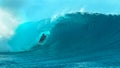 CLOSE UP: Pro surfer dude drags his hand through water while riding an epic wave Royalty Free Stock Photo