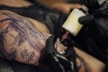 Close Up of Process of Creating Tattoo Art, Artist Draws on the Clients Skin