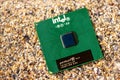 Close-up of a processor with sand in the background Royalty Free Stock Photo