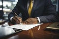 Close-up of a professional businessman's hands signing a legal document or contract Royalty Free Stock Photo