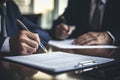 Close-up of a professional businessman's hands signing a legal document or contract Royalty Free Stock Photo