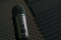 Close-up of professional condenser microphone on a black background Royalty Free Stock Photo