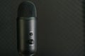 Close-up of professional condenser microphone on a black background Royalty Free Stock Photo