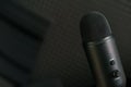 Close-up of professional condenser microphone on a black background Royalty Free Stock Photo