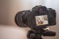 Close up of professional digital camera on tripod Royalty Free Stock Photo