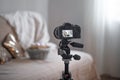 Professional digital camera on a tripod while shooting a home composition Royalty Free Stock Photo