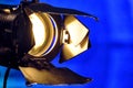 Close-up of a professional lighting fixture on a set or photographic studio. Concept of shooting a movie