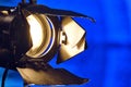 Close-up of a professional lighting fixture on a set or photographic studio. Concept of shooting a movie