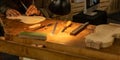 Close-up of a professional master artisan luthier working on the creation of a handmade violin