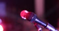 Close up of a professional vocal wire microphone on a microphone stand Royalty Free Stock Photo