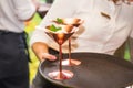 Close up Professional waiter in uniform with ice cream on a tray. Catering or celebration concept. Service at business, corporate Royalty Free Stock Photo