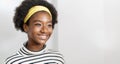 Close-up profile side view portrait of smiling young woman african american nice attractive lovely pretty lovable cheerful cheery Royalty Free Stock Photo