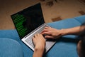 Close-up of programmer developer coding software program script on laptop display, typing keyboard for remote work at Royalty Free Stock Photo