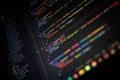 Close-up of programming code on a dark-themed interface with vibrant syntax colors, illustrating software development, modern Royalty Free Stock Photo