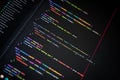 Close-up of programming source code with colorful syntax highlighting on a dark screen, illustrating software engineering, user Royalty Free Stock Photo