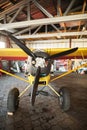 Close up on propeller of yellow airplane in hangar, ready for take off Royalty Free Stock Photo