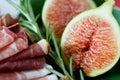 Close Up of Prosciutto, Figs and Rosemary Royalty Free Stock Photo