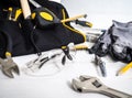 Close-up protective glasses among ools Royalty Free Stock Photo