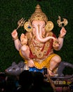 Close up prtrait view of decorated and garlanded idol of Hindu God Ganesha in Pune ,Maharashtra, India.