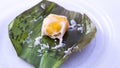 Close up of Pumpkin Koci or Kuih Koci Labu, the Malay glutinous rice flour made of pumpkin Royalty Free Stock Photo